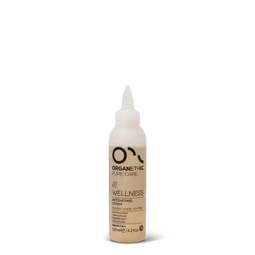 bottle of detoxifying scalp lotion.