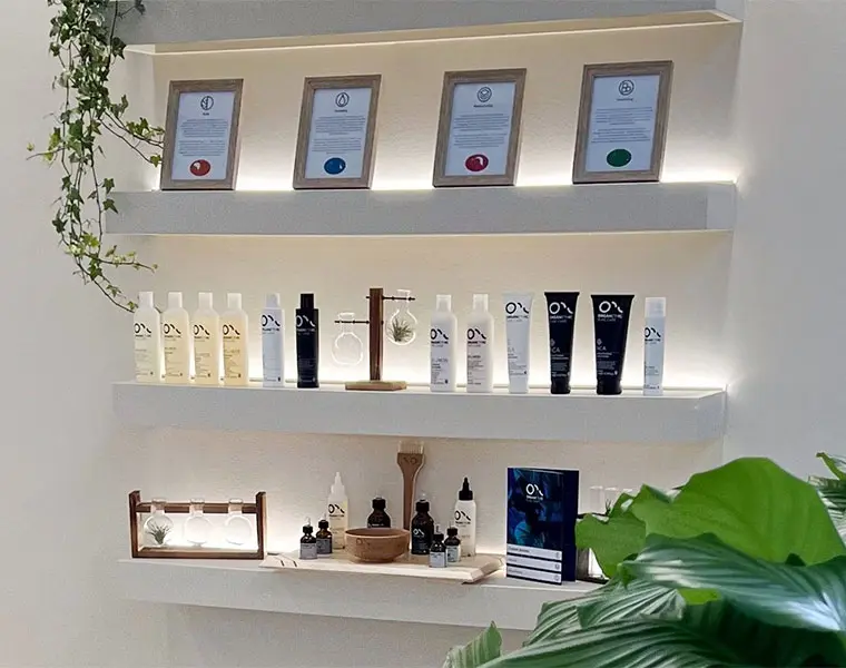 OPC hair products on a shelf in a salon