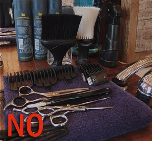 hairdressers scissors resting on a towel.