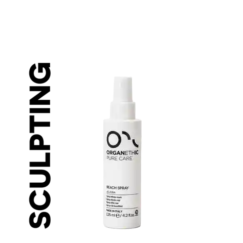 Bottle of OPC beach spray for hair styling.