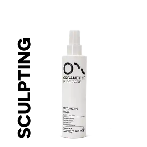 Bottle of OPC texturizing spray for hair.